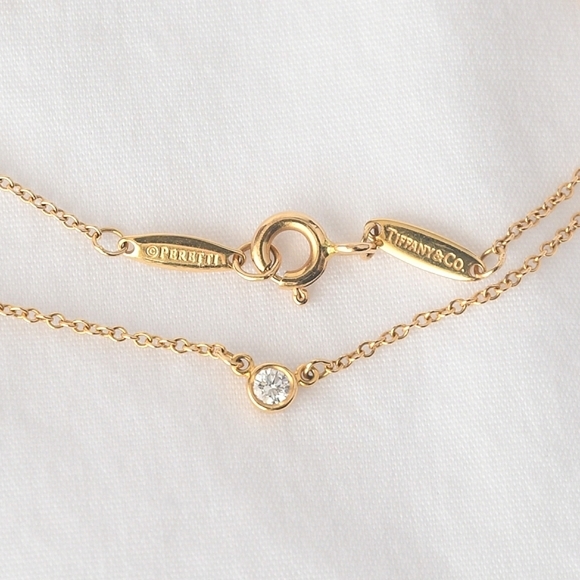 Tiffany & Co. Jewelry - Tiffany & Co. Diamonds by the Yard Single Diamond Pendant 0.14 ctw 18K Gold 750